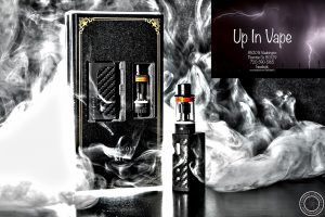 Mini Volt 40W Starter Kit by Council of Vapor The Mini Volt 40W is first starter kit developed by the Council of Vapor; famously for the Royal Hunter RDA, Royal Hunter Mini RDA and the Vengeance Sub Ohm Tank. The Mini Volt Box Mod is ultra sleek and compact, pushing out a maximum of 40W. The box mod has an internal 1300 mAh battery, minimum resistance of 0.2 ohm and incredibly easy to function. The Red Mini Volt 40W Box Mod has three different ramp modes: soft, standard and power. The body is constructed of a carbon fiber grip with a black rubberized paint coat. Virtually it’s the smallest mod on the market but it provides exceptional performance and solid functionality. Council of Vapor has also released additional color editions such as Red Mini Volt 40W Kit and White Mini Volt 40W Kit.  The Mini Volt Sub Ohm Tank measures in 22mm in diameter. The short stature advanced sub ohm tank holds 2ml’s of liquid, has dual adaptive adjustable airflow and the convenient top-fill method. The Mini Volt atomizer also contains an anti-spitback protection, very similar to the Vengeance Tank and a wide bore drip tip. Council of Vapor includes a total of two 0.8 ohm coil units made of micro fibers for delivering exceptional flavor. The Mini Volt 40W Starter Kit by Council of Vapor is a beautifully crafted vaping system that you can take anywhere. Achieve a satisfying vape with the the classic black edition.  Vapor Shop Thornton Colorado